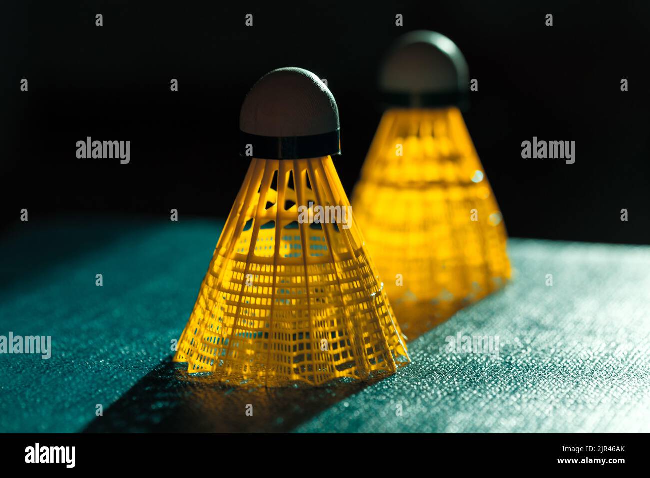 Badminton Birdie . Shuttlecocks in dim light Stock Photo