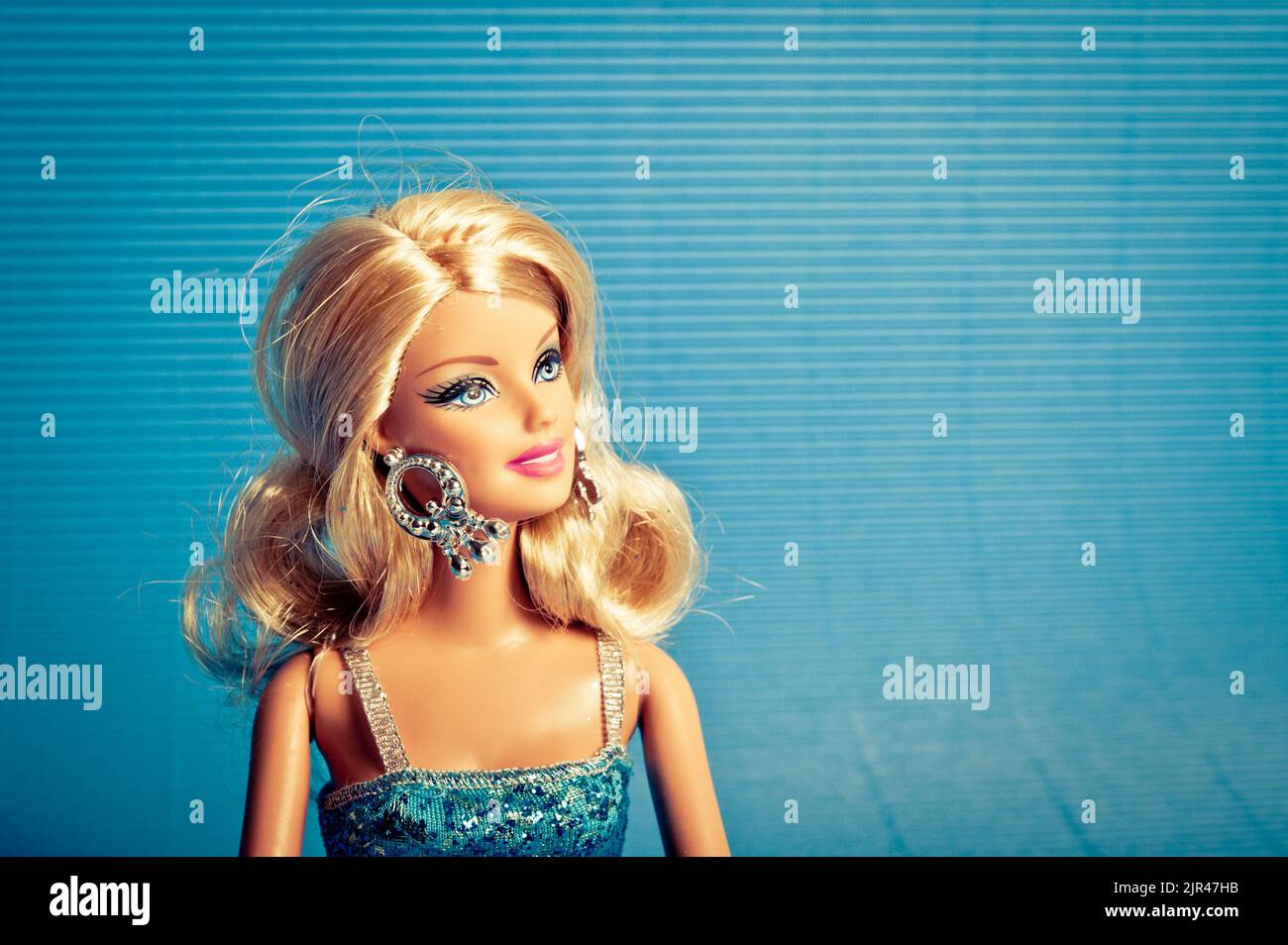 Barbie doll in blue dress hi-res stock photography and images - Alamy