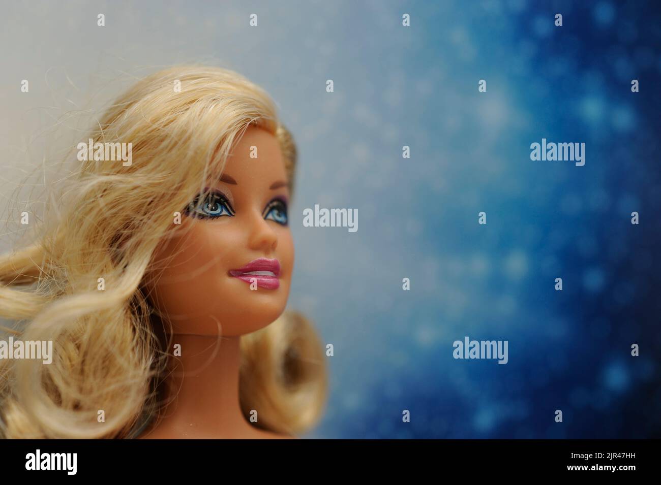 Blonde Barbie doll face close up with copy space Stock Photo