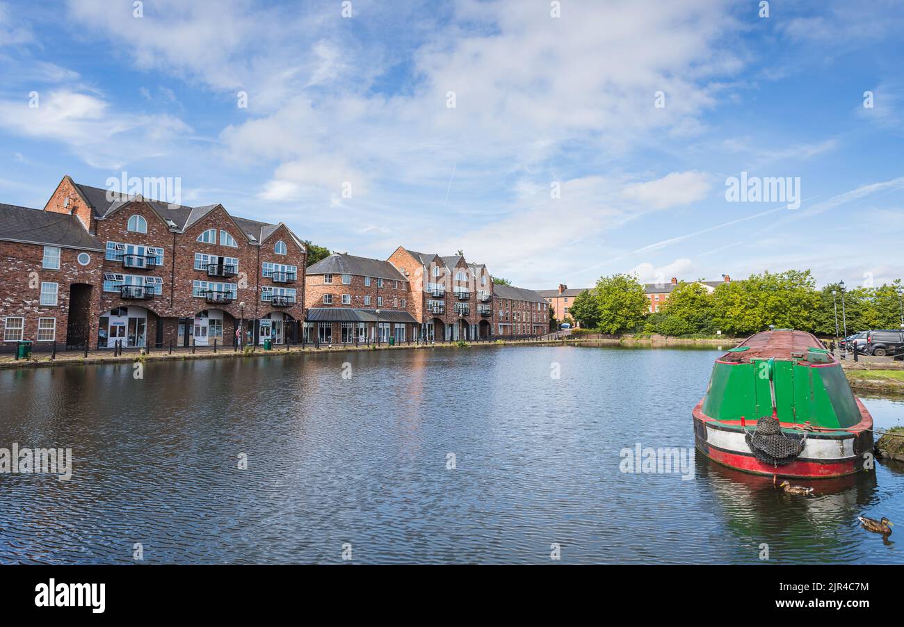 Narrow boat in Ellesmere Port canal basin pictured in Cheshire in August 2022. Stock Photo