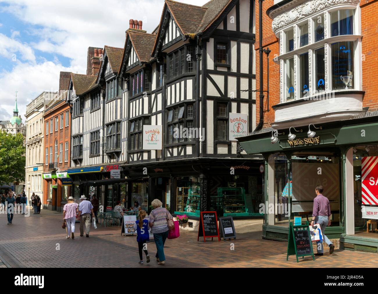 Shops and shoppers, mock Tudor half timbered buildings in town centre