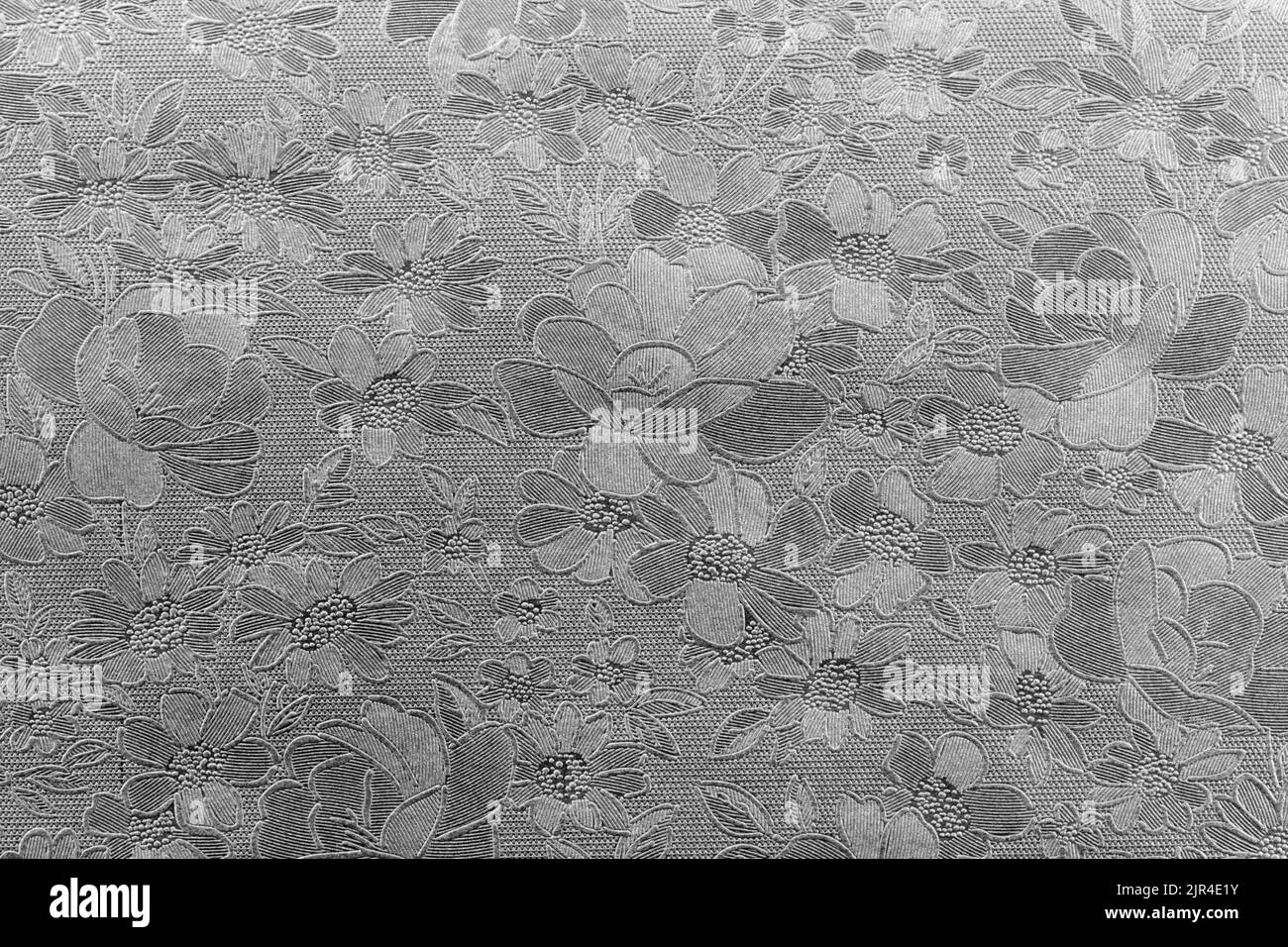 silver floral ornament brocade textile pattern.Gold background texture. Element of design. Stock Photo