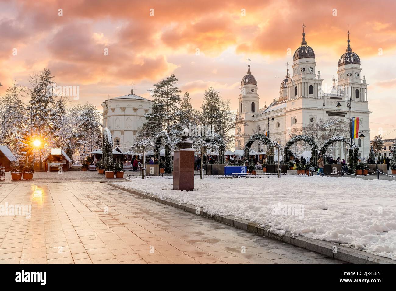 Christmas market and decorations tree in center of Iasi town at sunset, Romania Stock Photo