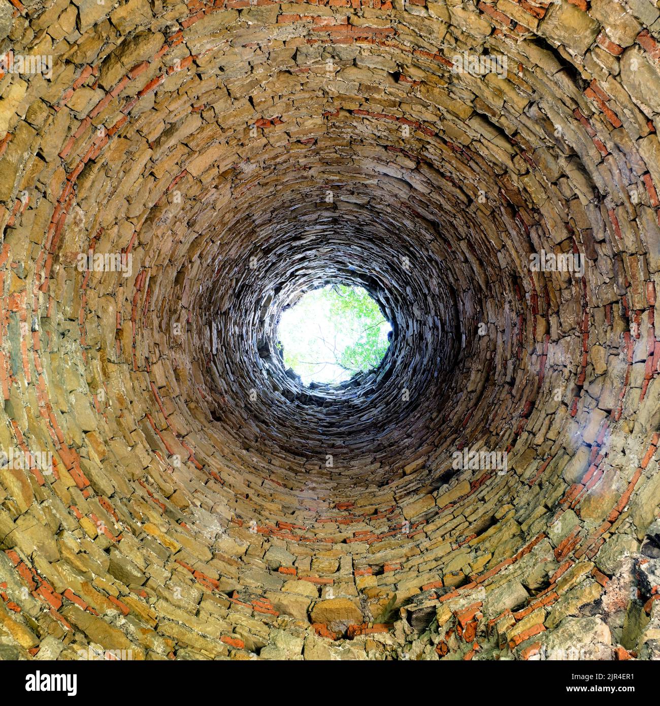 Old brick chimmey from indoor Stock Photo