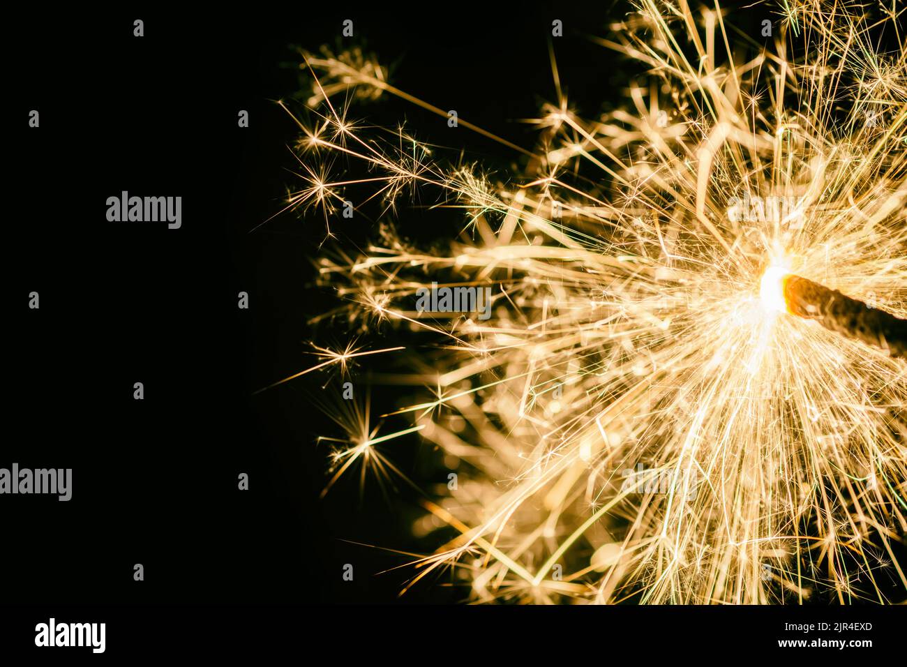 Sparkler as background on the theme of New Year's Eve Stock Photo