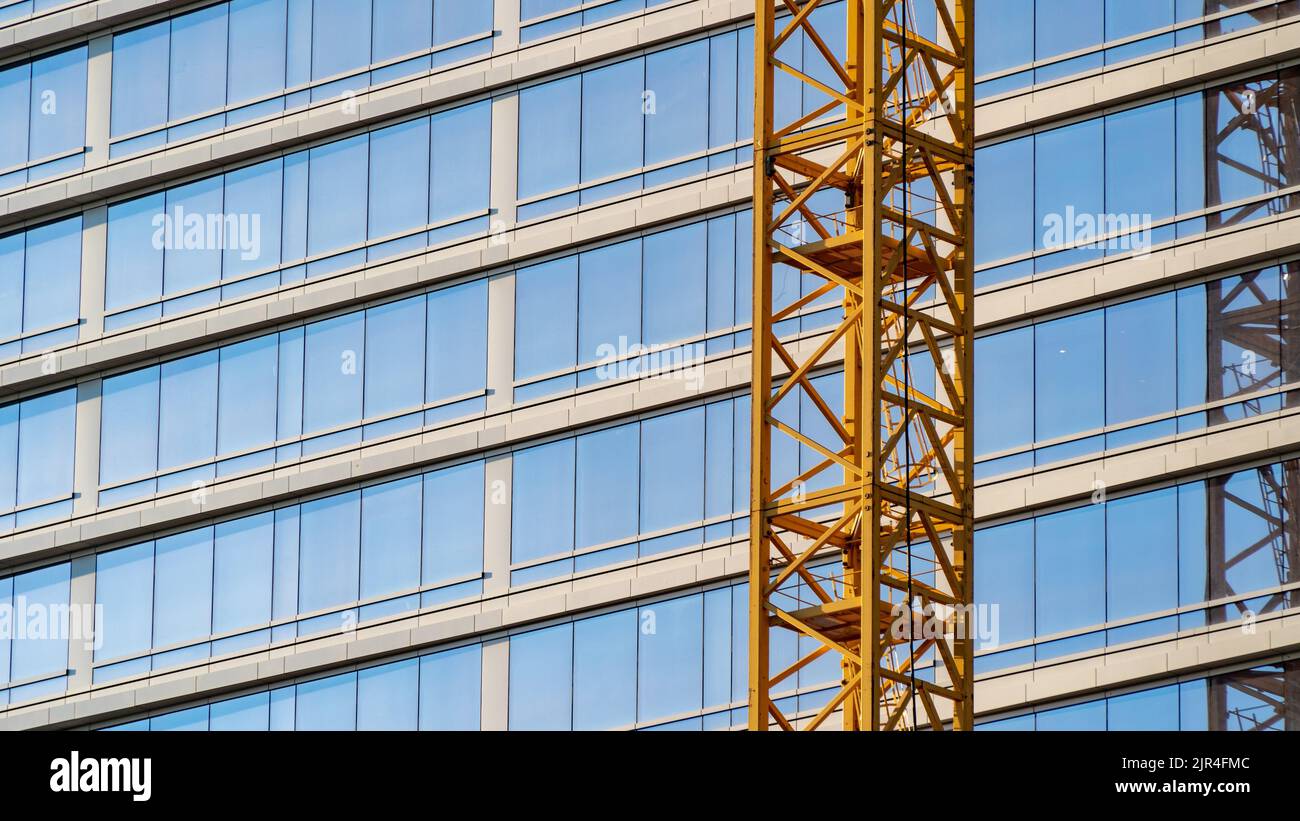 View of Modern glass office building with exposed steel framework Stock Photo ...