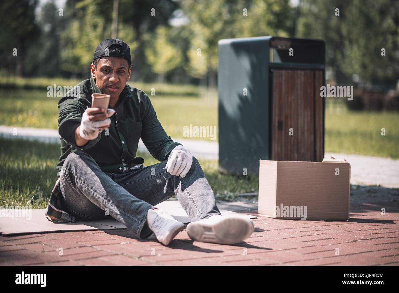 man sitting on ground