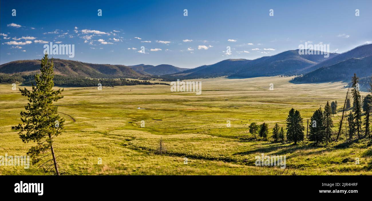 Valle Grande, Cerro del Medio on left, Cerro de los Posos in distance, at  Valles Caldera National Preserve, New Mexico, USA Stock Photo