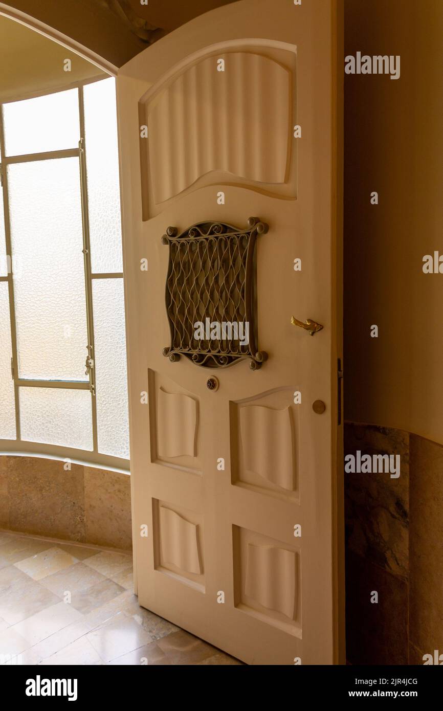 A vertical shot of an interior door interior of La Pedrera (Casa Mila ...