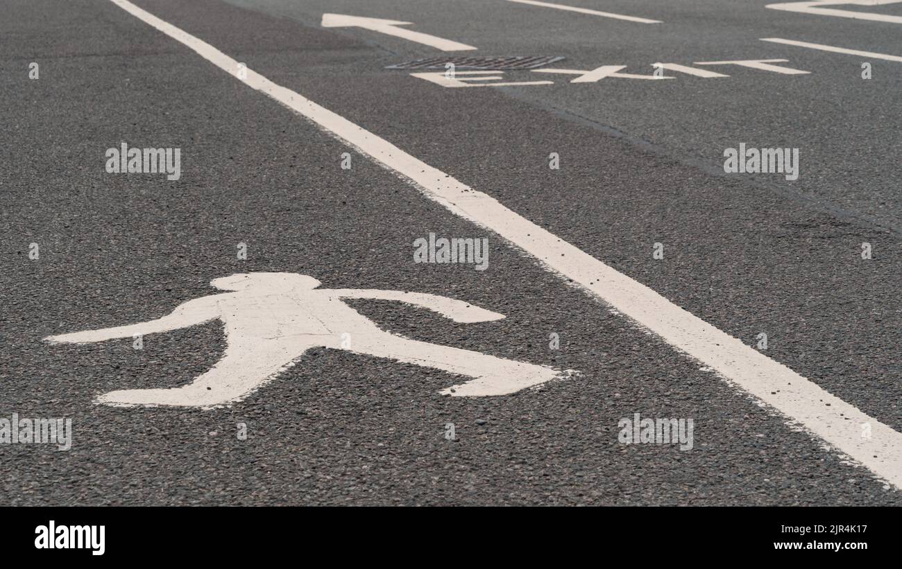 Pedestrian crossing road marking white hi-res stock