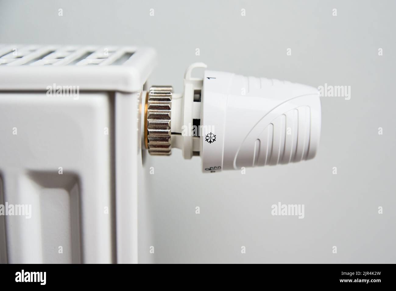 Heating radiator with temperature control knob, Energy crisis concept ...