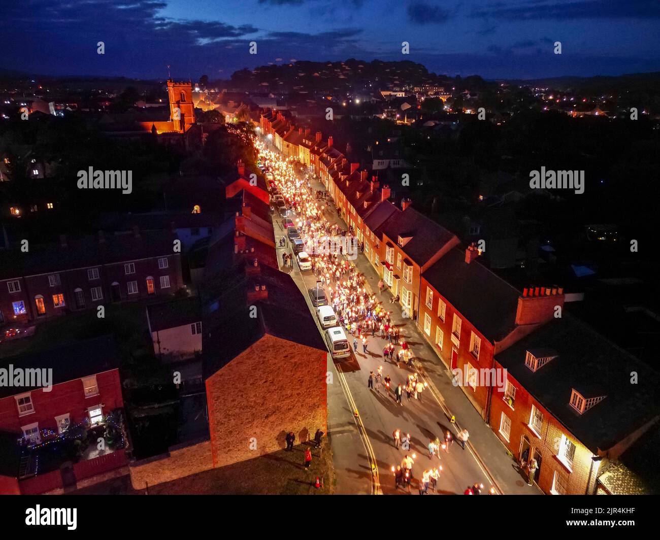Bridport, Dorset, UK. 21st August 2022. View from the air as hundreds of revellers turn out for
