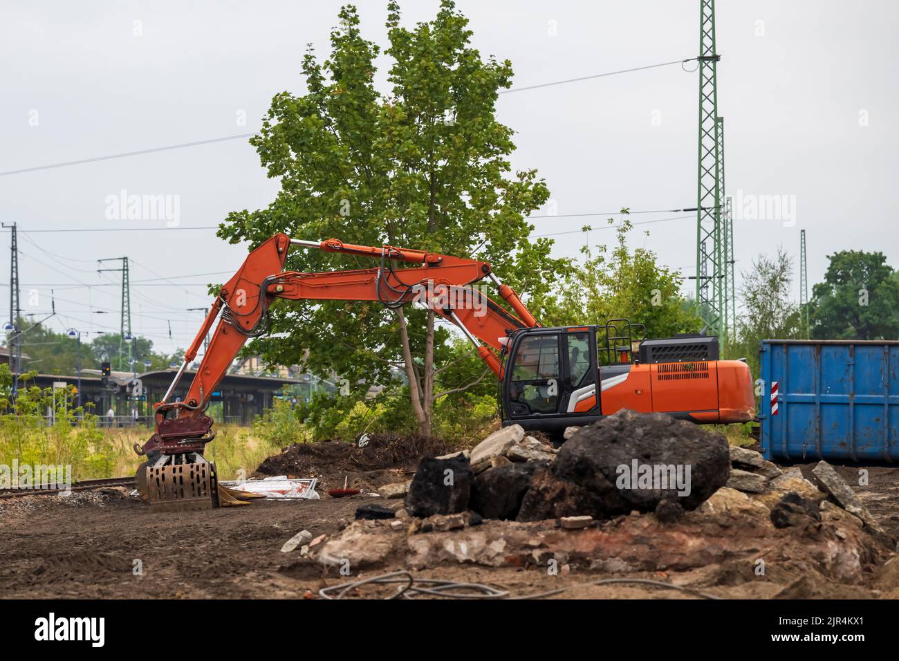 A parked excavator on a construction site Stock Photo