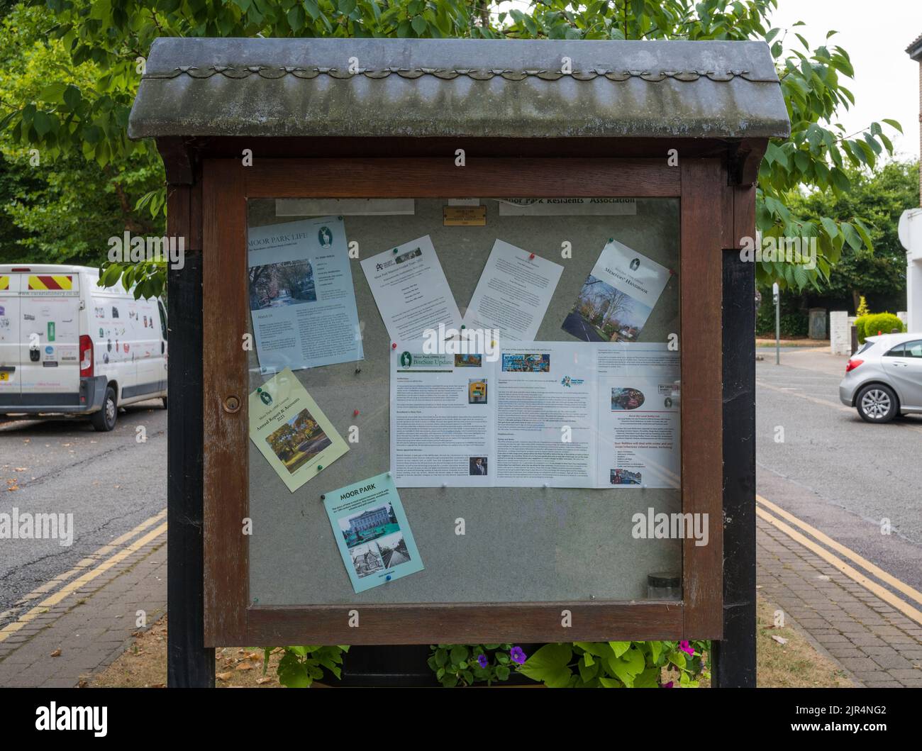 Community noticeboard on the central reservation on Main Avenue in the