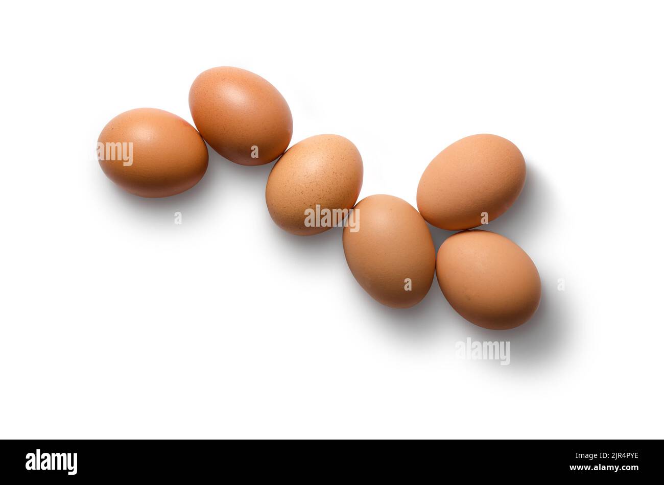 Six brown hens eggs isolated on white background with path Stock Photo