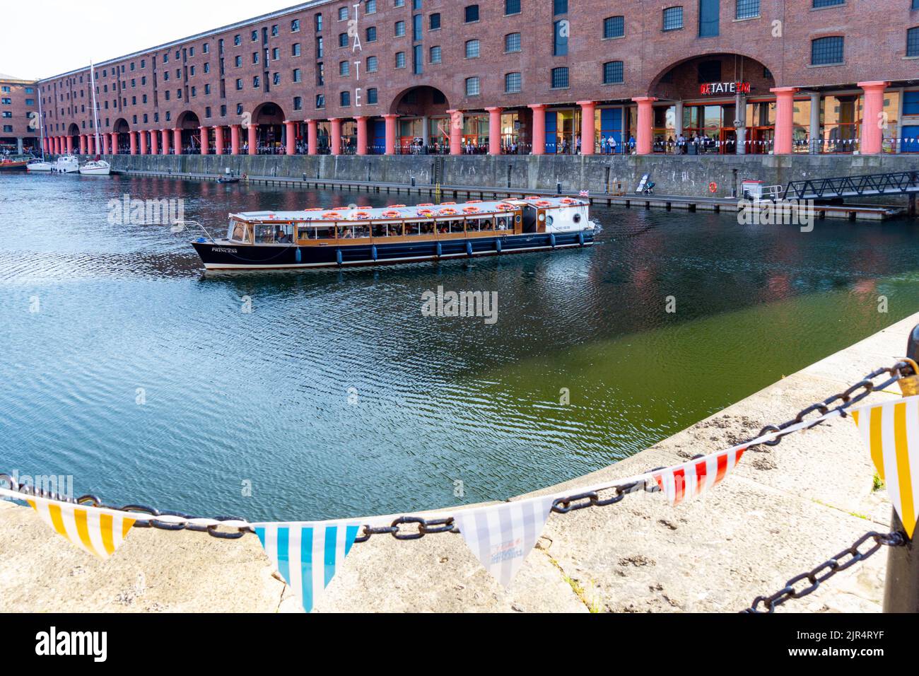 Tour barge in Royal Albert Dock in Liverpool Stock Photo
