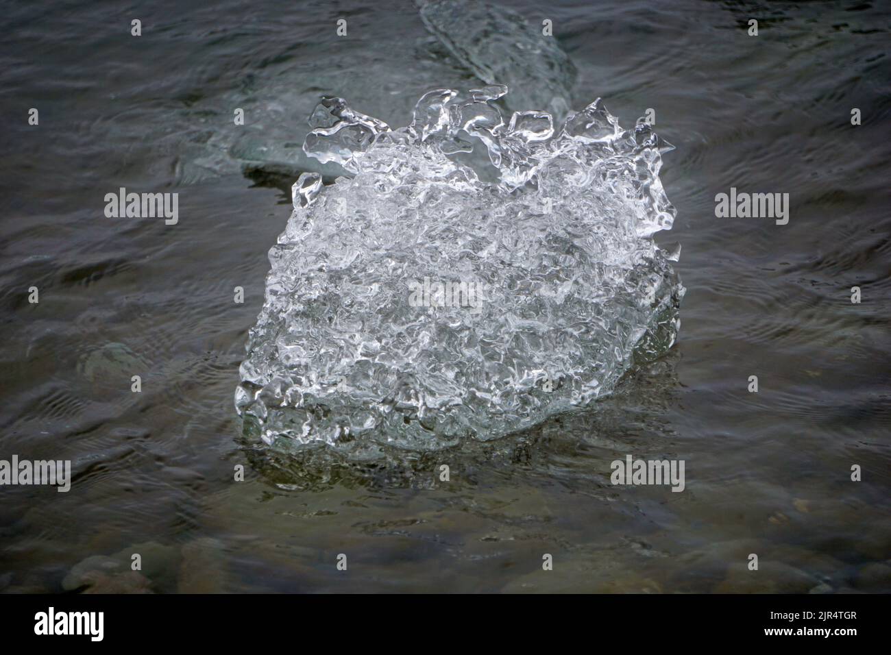 Ice melting into water hi-res stock photography and images - Alamy