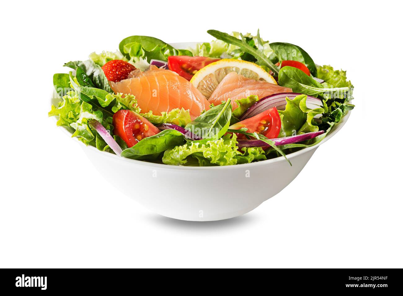Fresh green leafy salad with smoked salmon, cherry tomato and onion isolated on white background Stock Photo