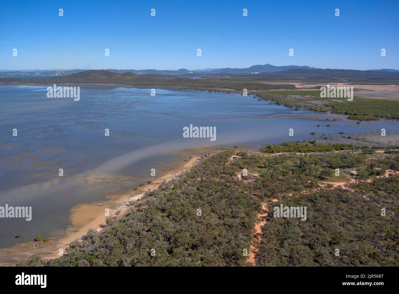 Aerial from Southend over Curtis Island to Gladstone Queensland Australia Stock Photo