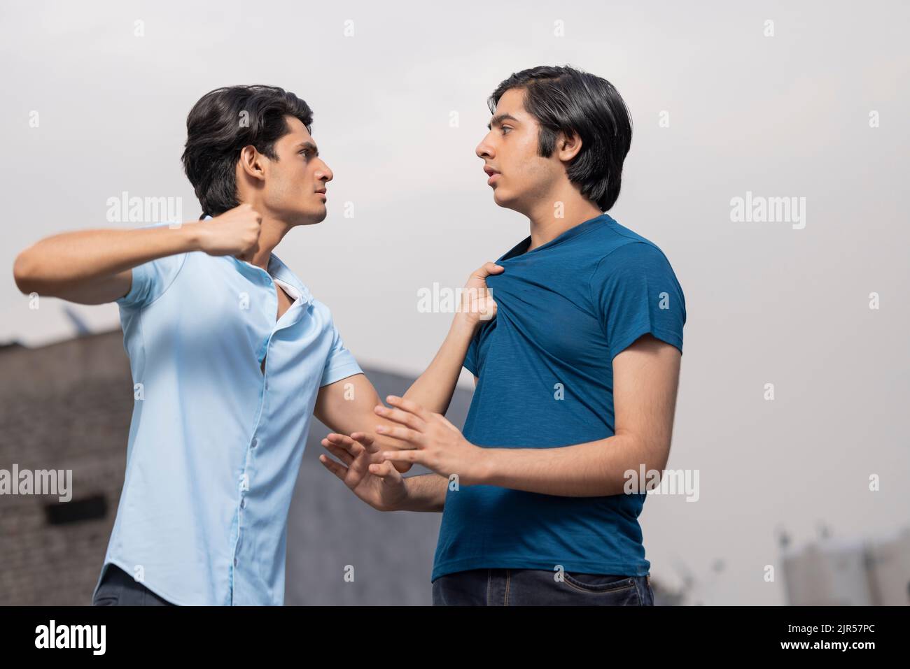 Standing boy pulling hires stock photography and images Alamy