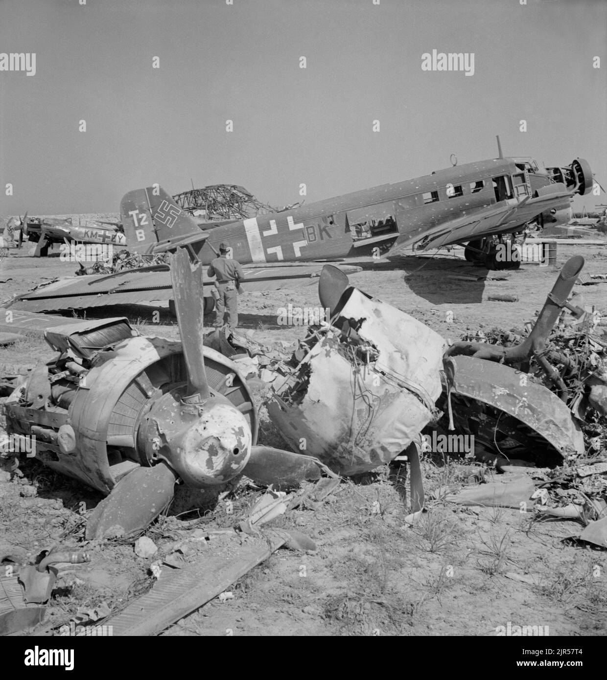 A vintage photo circa May 1943 showing a wrecked German Junkers JU52 transport aircraft at El Aouiana Tunisia after the defeat of the Axis forces in North Africa Stock Photo