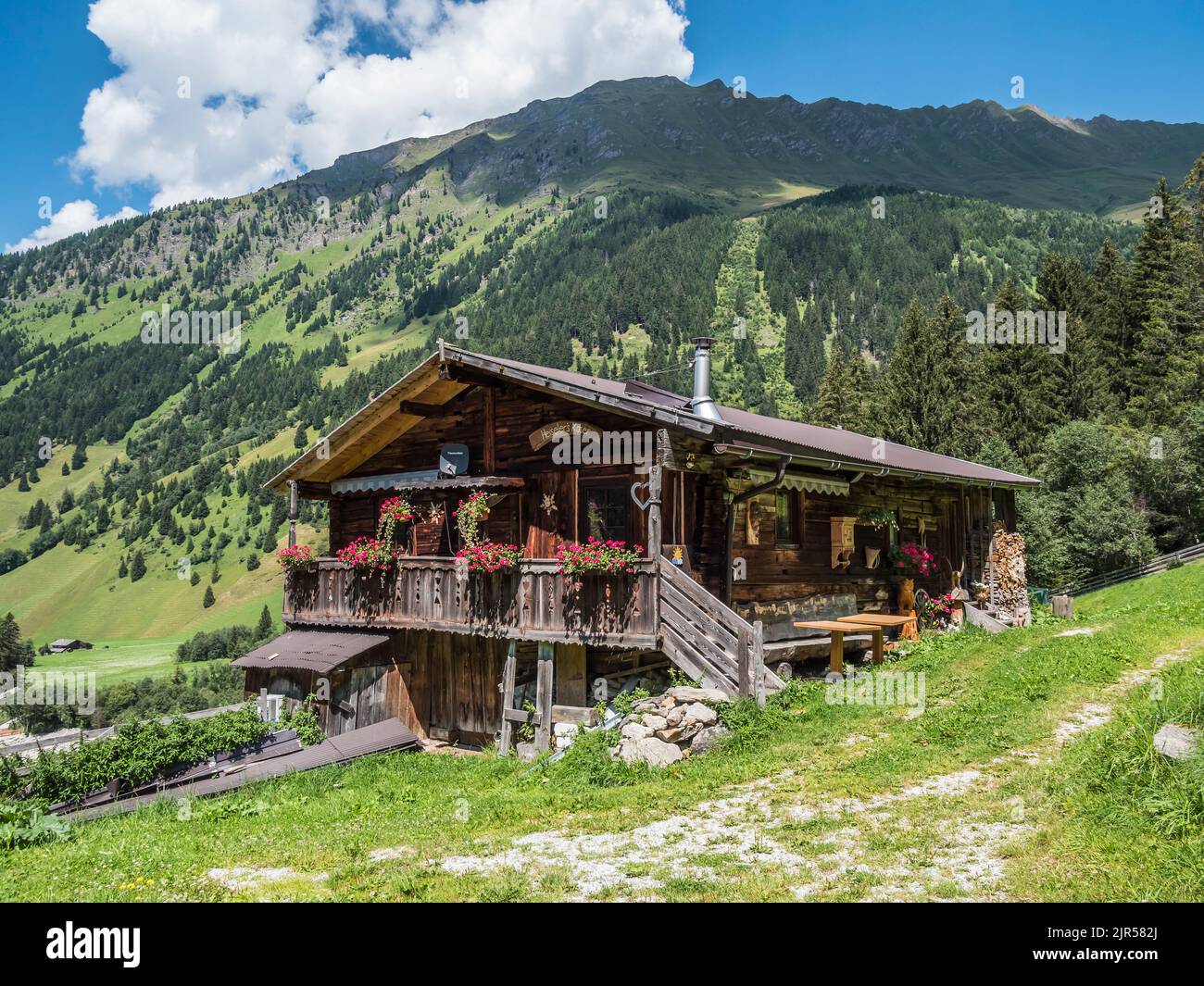 The image is of one of several farm alms near Touristenrast Gasthof at the head of the Valsertal valley in the Zillertal Alps of the Austrian Tirol Stock Photo