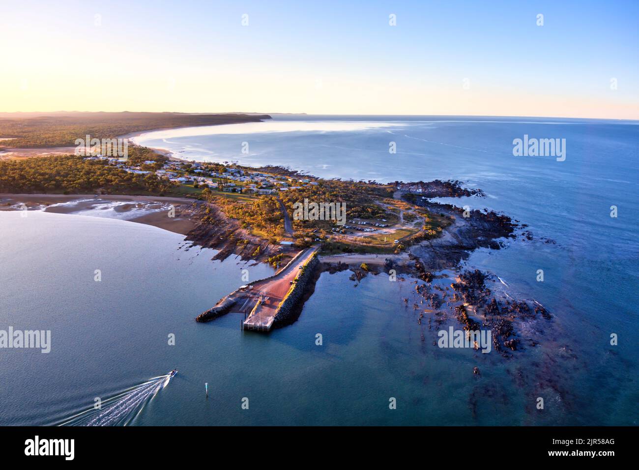Aerial of the boat ramp at Southend the only village on Curtis Island Queensland Australia Stock Photo