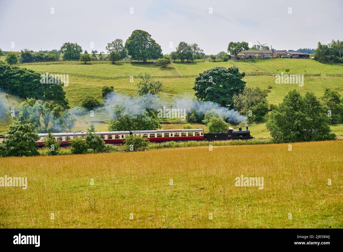 Steam train in the hills, on the Embsay Steam Railway, near Skipton, Yorkshire Dales, Northern England, UK Stock Photo