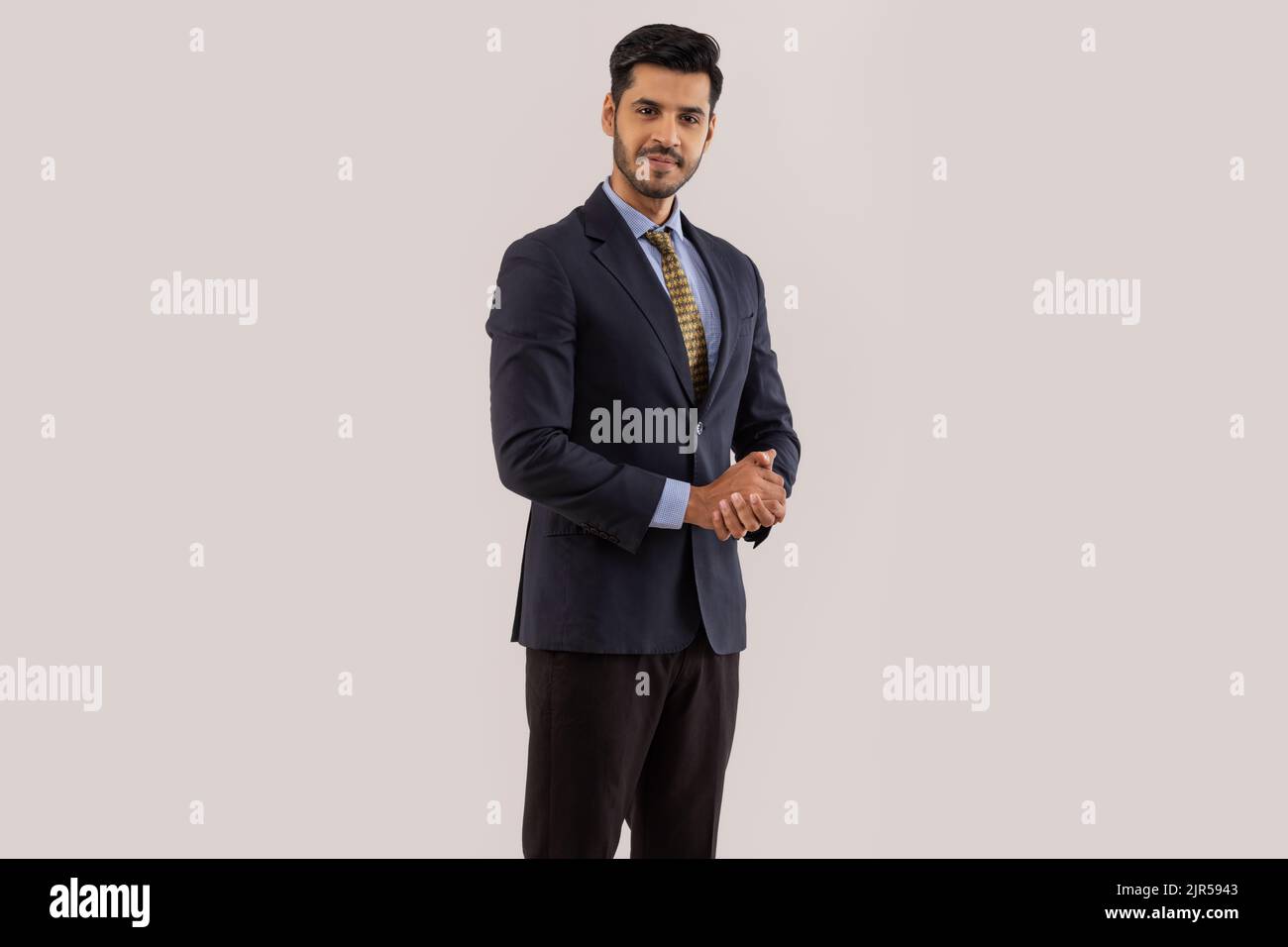 portrait-of-a-corporate-employee-in-formal-business-suit-standing-with