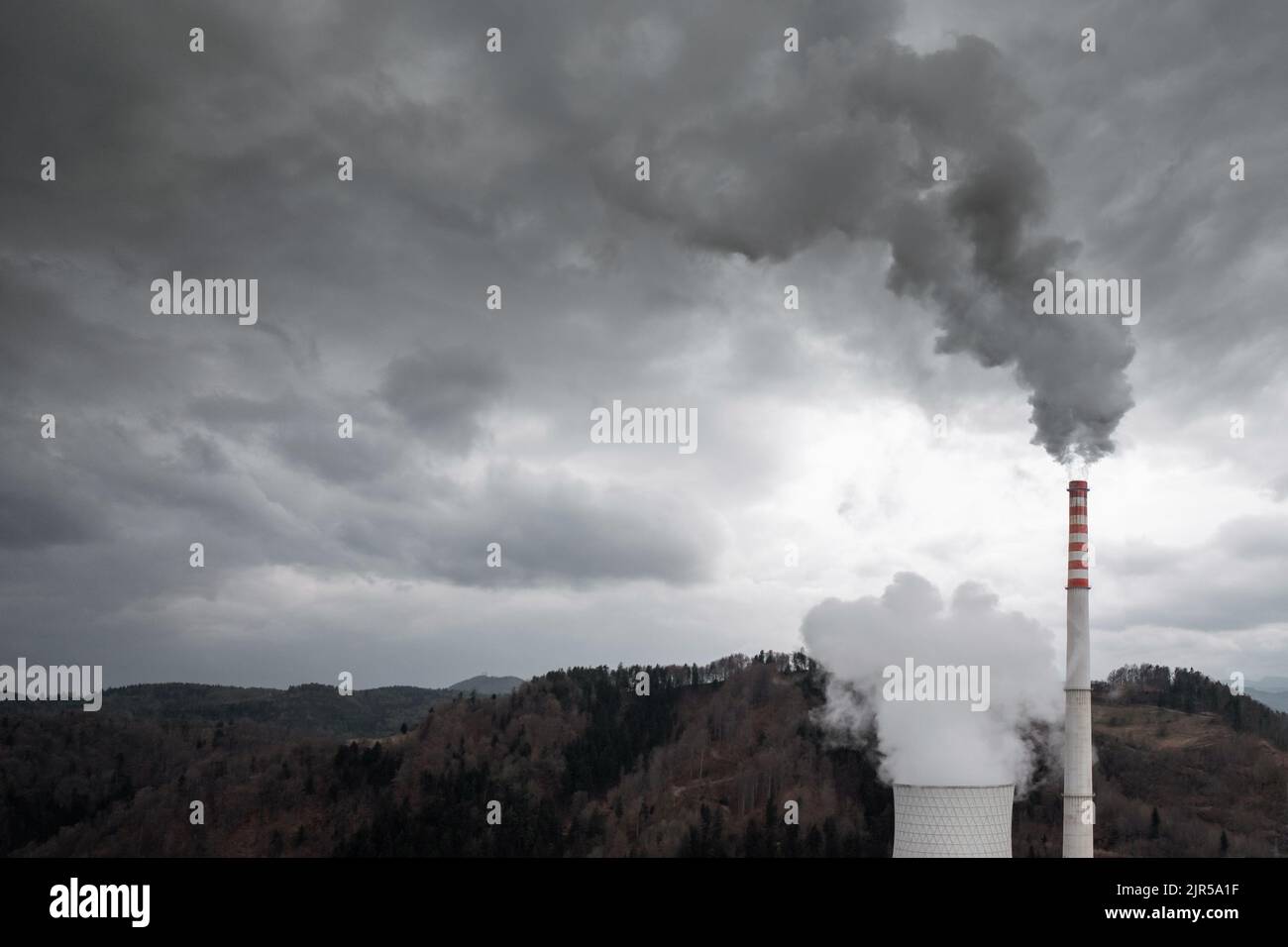 Thermal power plant cooling tower releasing smoke and co2 rich