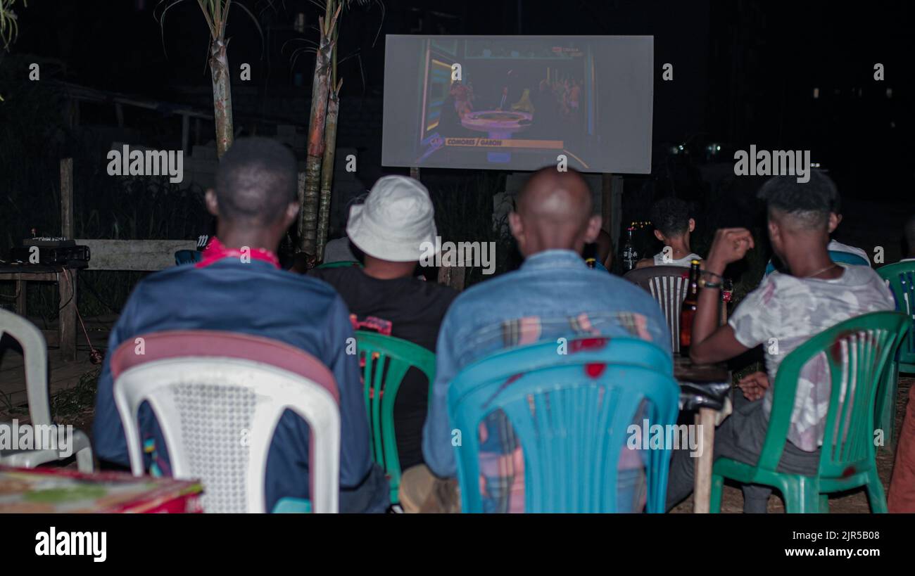 Gabonese supporters on January 10, 2022 during the Comoros-Gabon match for the 2021 African Cup of Nations which they watched on a giant screen in a 'maquis' (bistro) in the middle of Libreville.  Score of the match: Comoros-Gabon: 0-1. Stock Photo