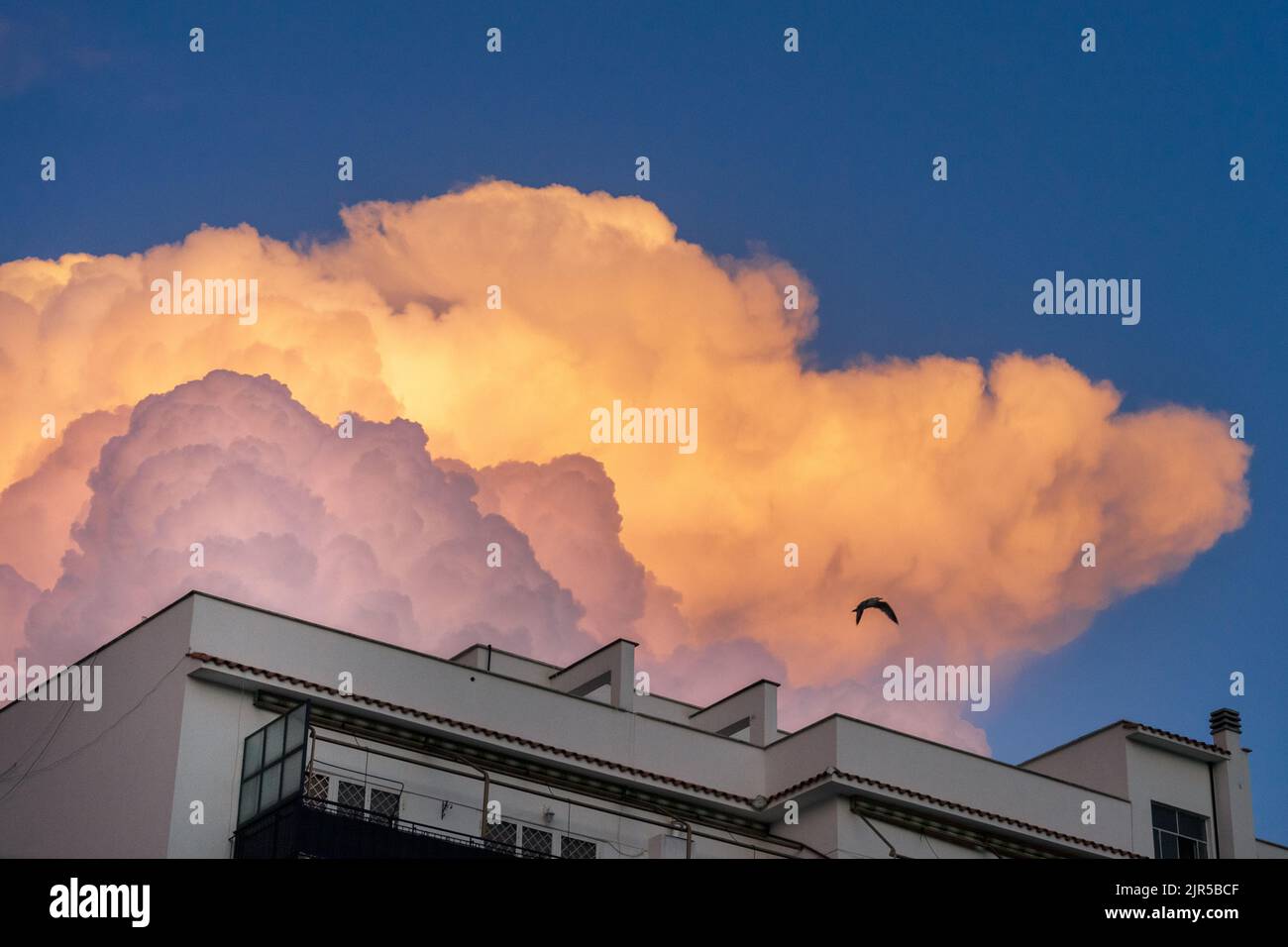 Rome, Italy: clouds hang over the buildings in east Rome Stock Photo