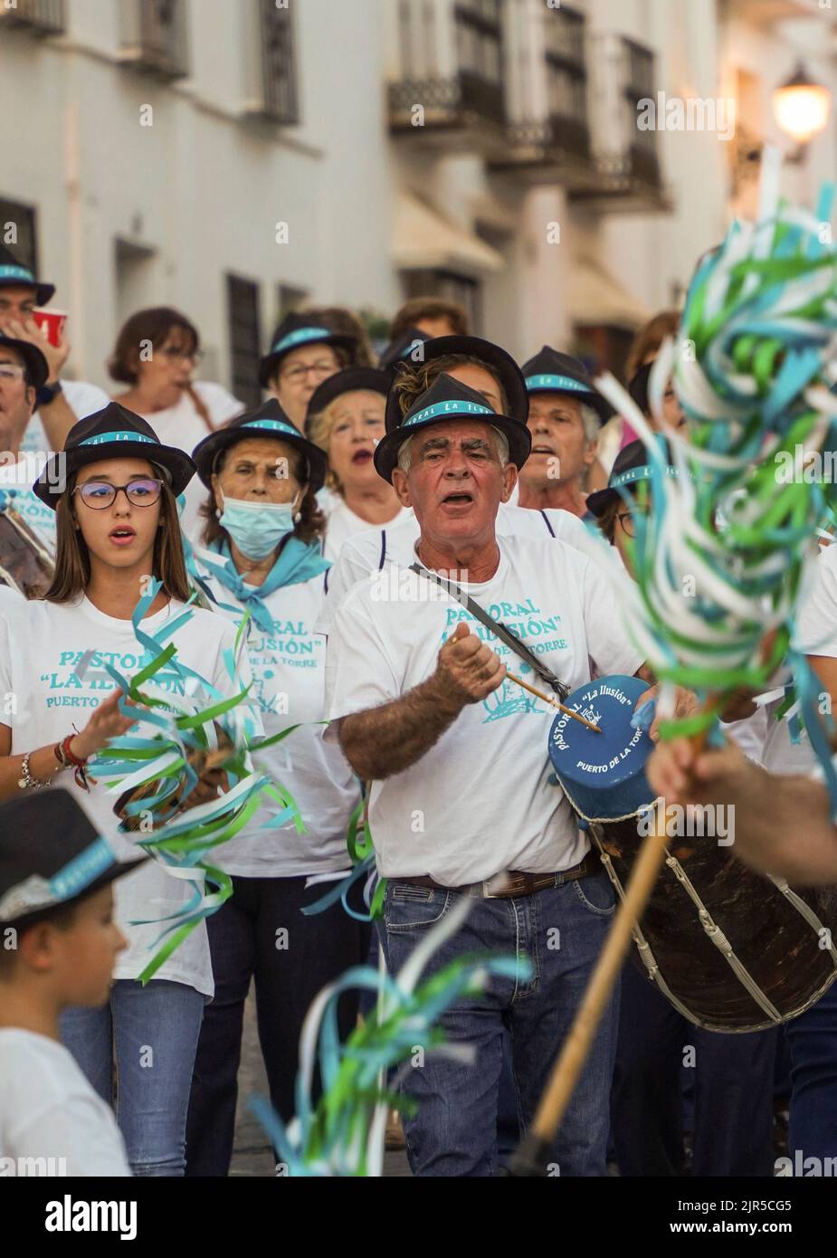 Groups of spanish Pastorales singing typical Christmas Carols, with Zambomba instruments, as an exception in summer. Mijas, Spain. Stock Photo