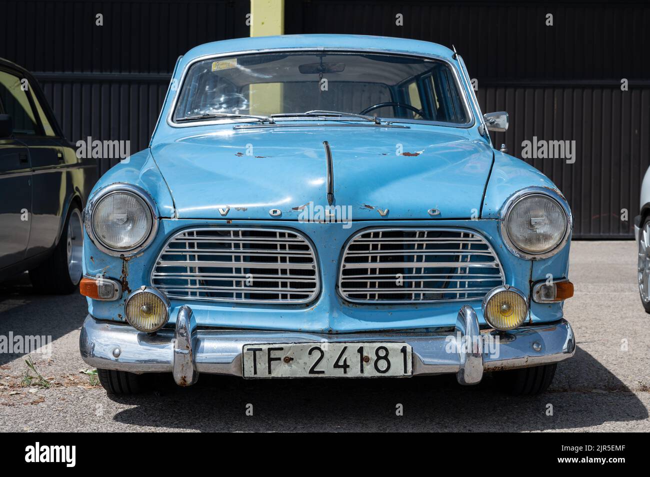 A blue classic Volvo Amazon car parked on the street Stock Photo