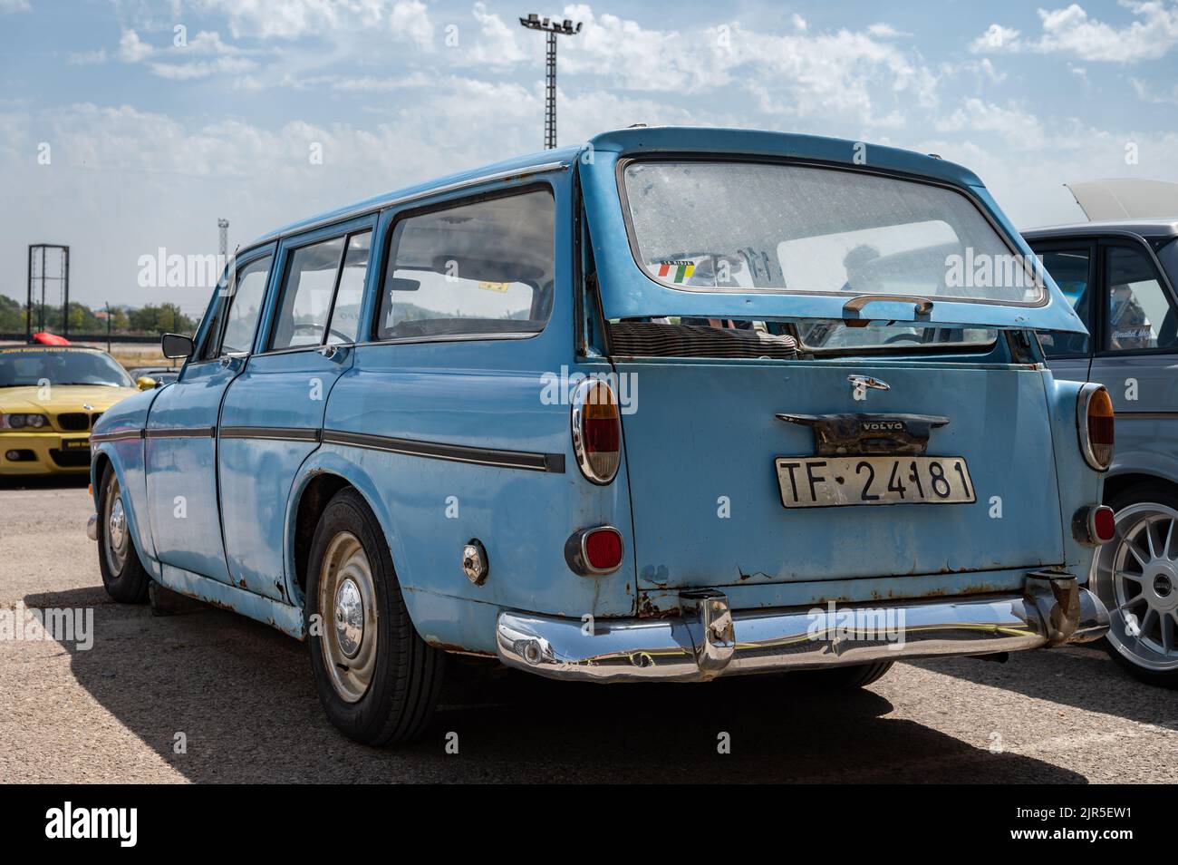 A blue Volvo Amazon classic car parked on the street Stock Photo