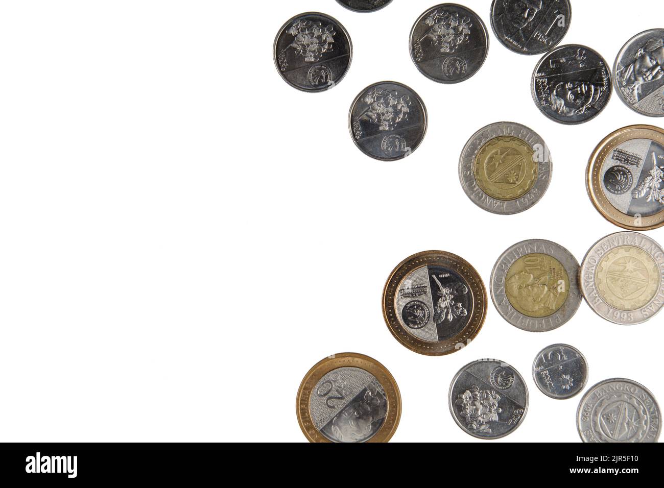 A Flat Lay background of Philippine Coins isolated on a white background with copy space. Stock Photo