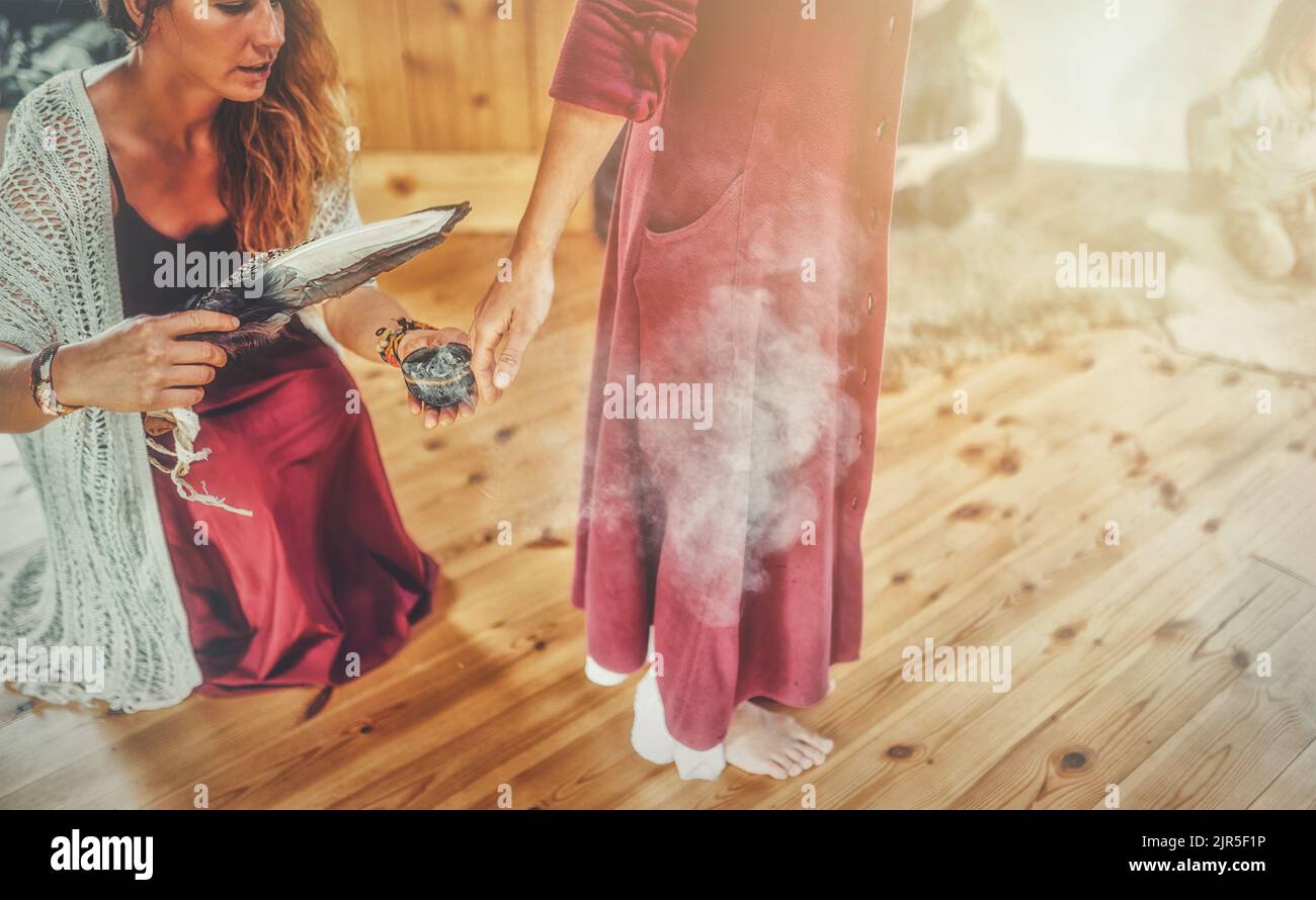 incense in a woman hand, ceremony space Stock Photo Alamy