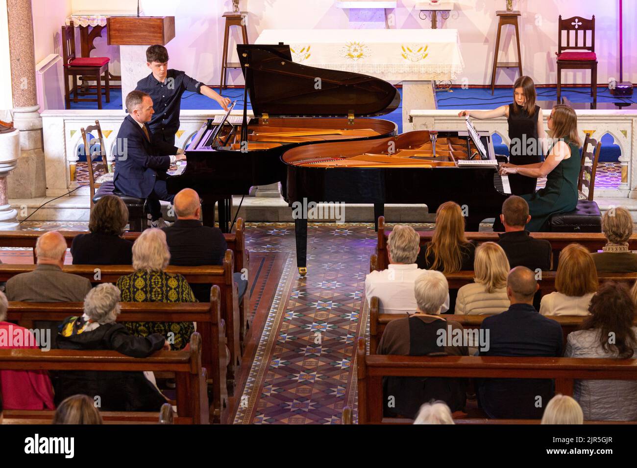 Two Piano Concert in a Church. Valentia Island, County Kerry, Ireland Stock Photo