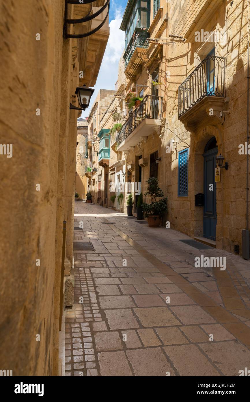 A typical view on Valetta, the capital of Malta and UNESCO world heritage site. The honey coloured buildings and walls perfectly capture the warmth Stock Photo
