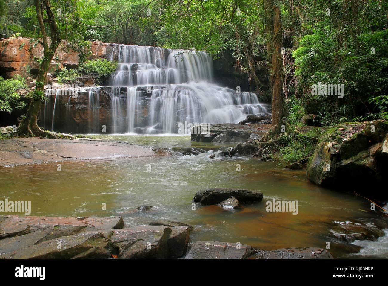 landscape photo, beautiful waterfall in green forest Stock Photo