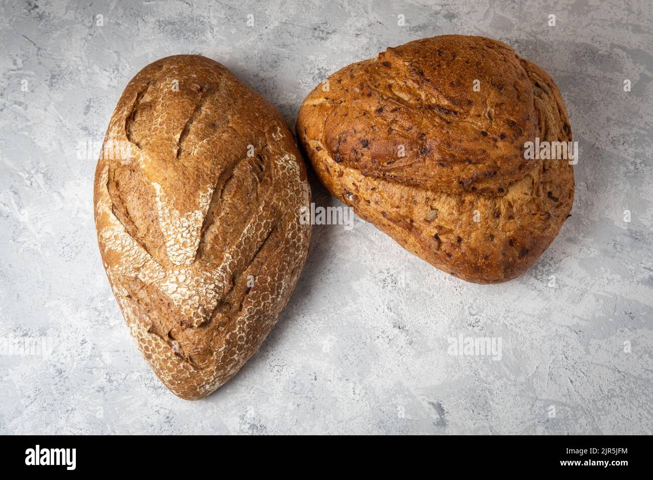 Top of view of two cereal or wholemeal bread molds. Sourdough bread concept Stock Photo Alamy