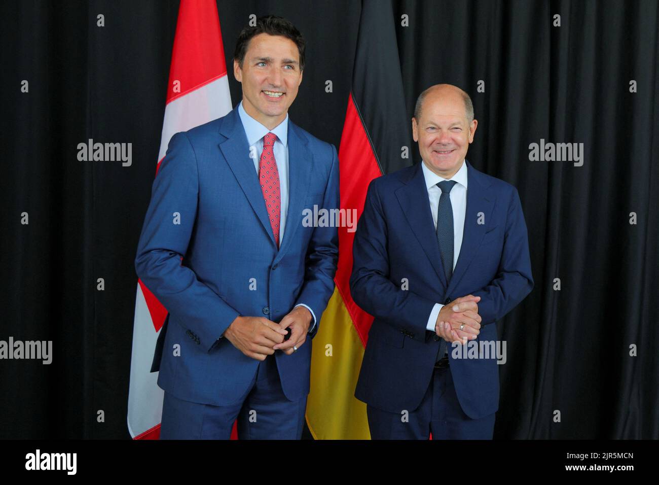 Canada's Prime Minister Justin Trudeau welcomes Germany's Chancellor Olaf Scholz at the Montreal Science Centre in Montreal, Quebec, Canada August 22, 2022.  REUTERS/Christinne Muschi Stock Photo