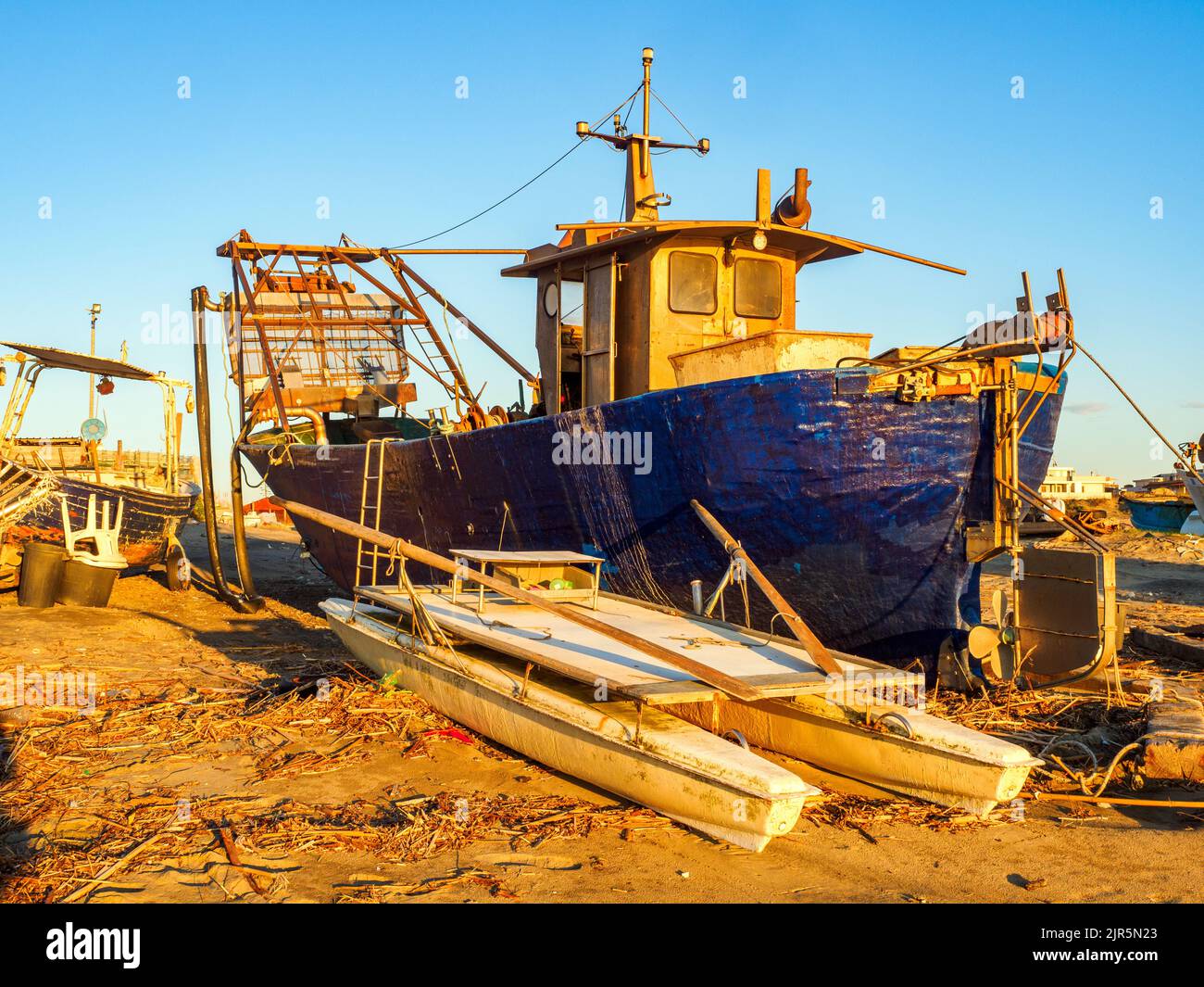 Fishing boat in the beach of Torvaianica -Rome, Italy Stock Photo