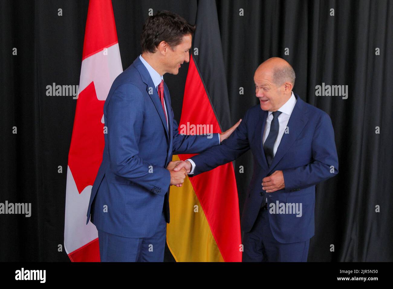 Canada's Prime Minister Justin Trudeau shakes hands with Germany's Chancellor Olaf Scholz during their meeting at the Montreal Science Centre in Montreal, Quebec, Canada August 22, 2022.  REUTERS/Christinne Muschi Stock Photo