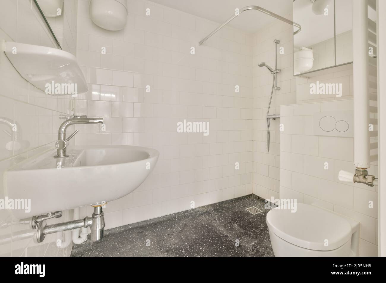 Modern home interior design of white bathroom with open bathtub and