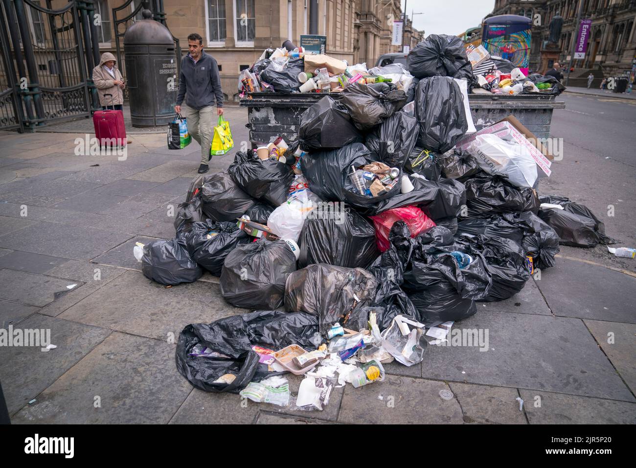 Bins and litter along Chambers Street in Edinburgh city centre as