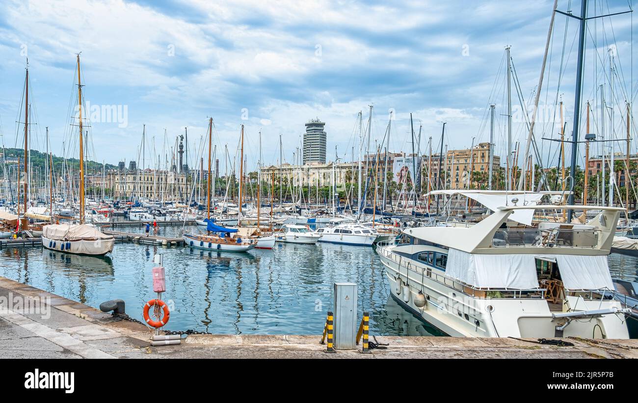 Large quantity of yachts or recreational boats in a urban marina facility Stock Photo