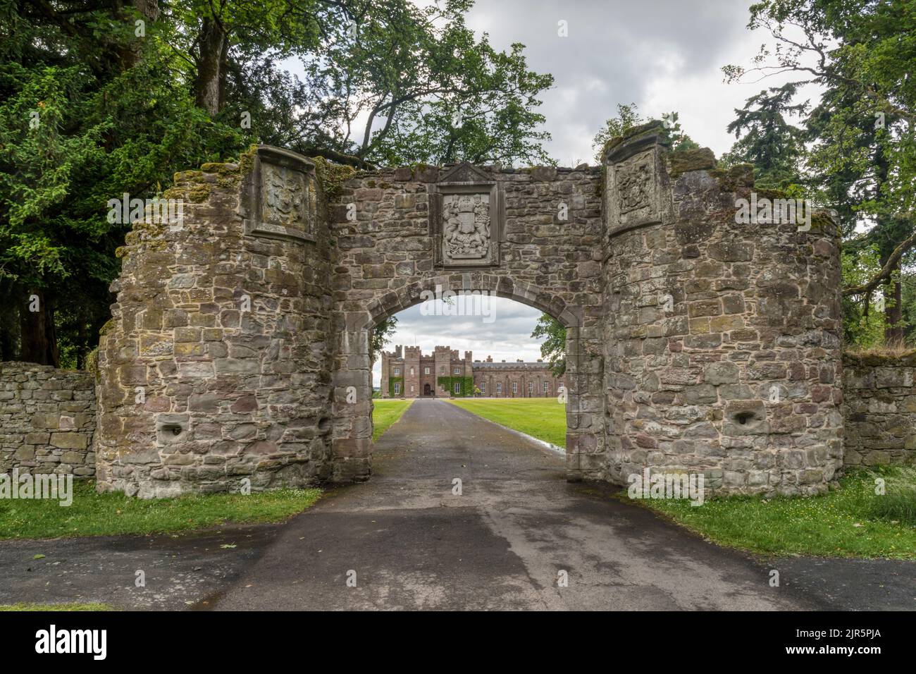 Scone Palace outside Perth, seen through the restored 16th century archway of the former Augustinian abbey. Stock Photo