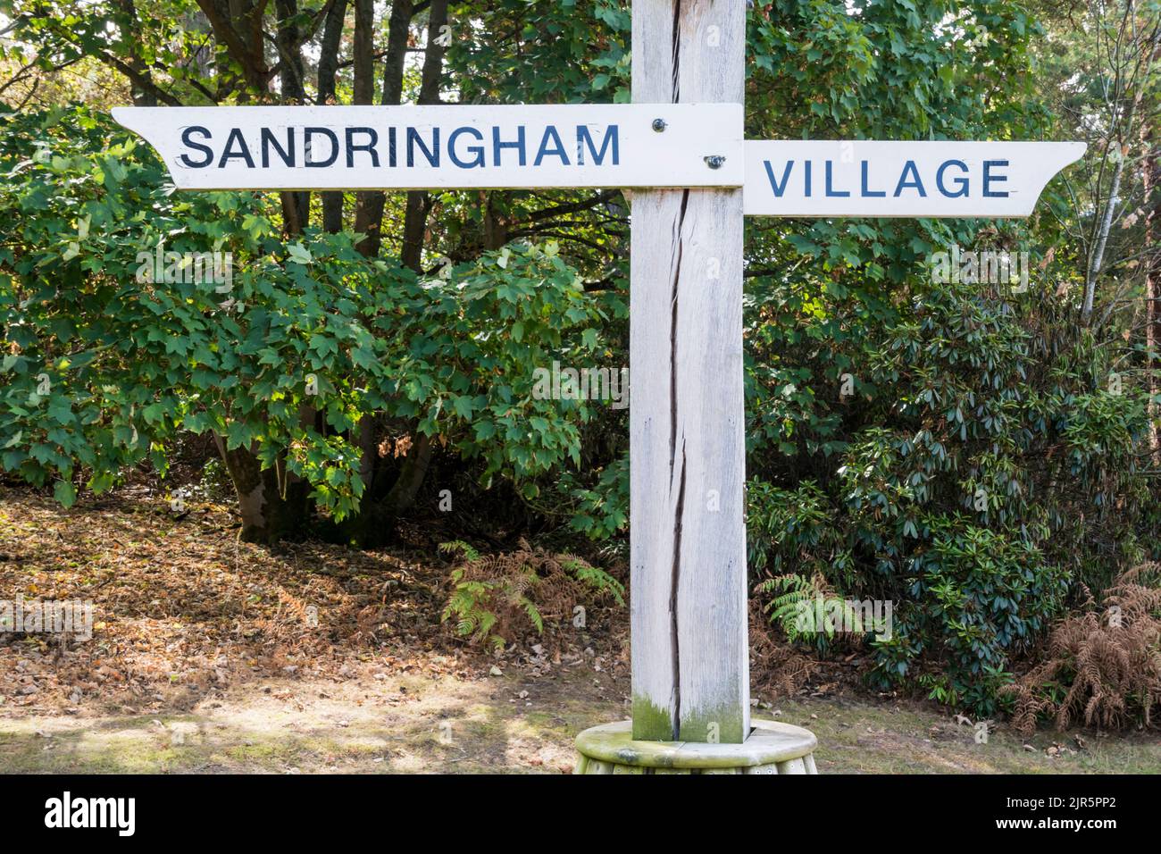 Sign on the Sandringham Estate points to Sandringham in one direction and Village in the other. Stock Photo