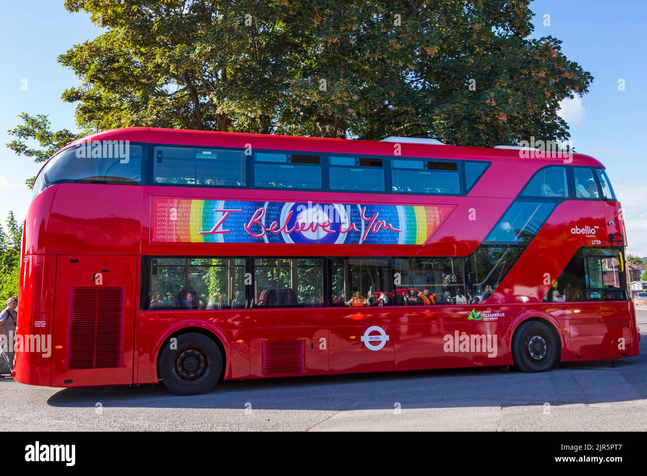 I believe in You message on side of Hybrid CleanerAir for London abellio LT39 red double decker bus Stock Photo